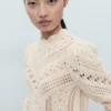 Strickpullover mit Spitzenakzenten
