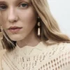 Strickpullover mit Spitzenakzenten