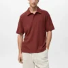 Strukturiertes Strick-Poloshirt Strukturiertes Strick-Poloshirt