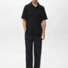 Strukturiertes Strick-Poloshirt Strukturiertes Strick-Poloshirt