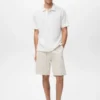 Strukturiertes Strick-Poloshirt Strukturiertes Strick-Poloshirt