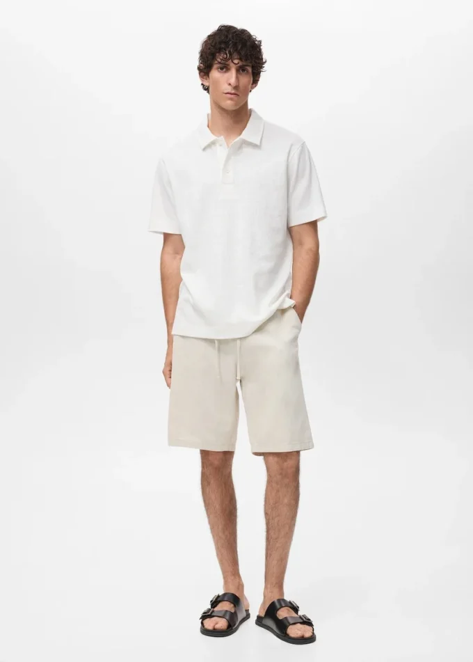 Strukturiertes Strick-Poloshirt Strukturiertes Strick-Poloshirt