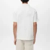 Strukturiertes Strick-Poloshirt Strukturiertes Strick-Poloshirt