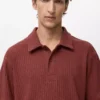 Strukturiertes Strick-Poloshirt Strukturiertes Strick-Poloshirt