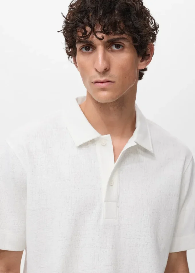 Strukturiertes Strick-Poloshirt Strukturiertes Strick-Poloshirt