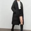 Taillierter, gesteppter Anorak mit Kapuze Taillierter, gesteppter Anorak mit Kapuze