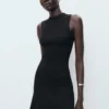 Tailliertes Strickkleid Tailliertes Strickkleid