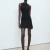 Tailliertes Strickkleid Tailliertes Strickkleid