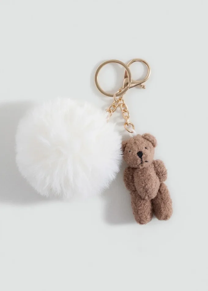Teddybär-Schlüsselanhänger mit Bommel Teddybär-Schlüsselanhänger mit Bommel