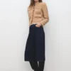 Tweedjacke mit ausgefransten Enden Tweedjacke mit ausgefransten Enden