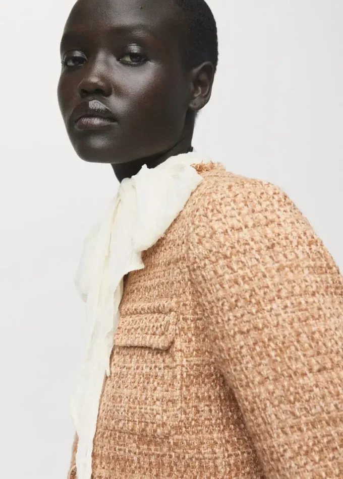 Tweedjacke mit ausgefransten Enden Tweedjacke mit ausgefransten Enden