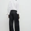Weite Denimhose mit Falten