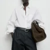 Weite Denimhose mit Falten