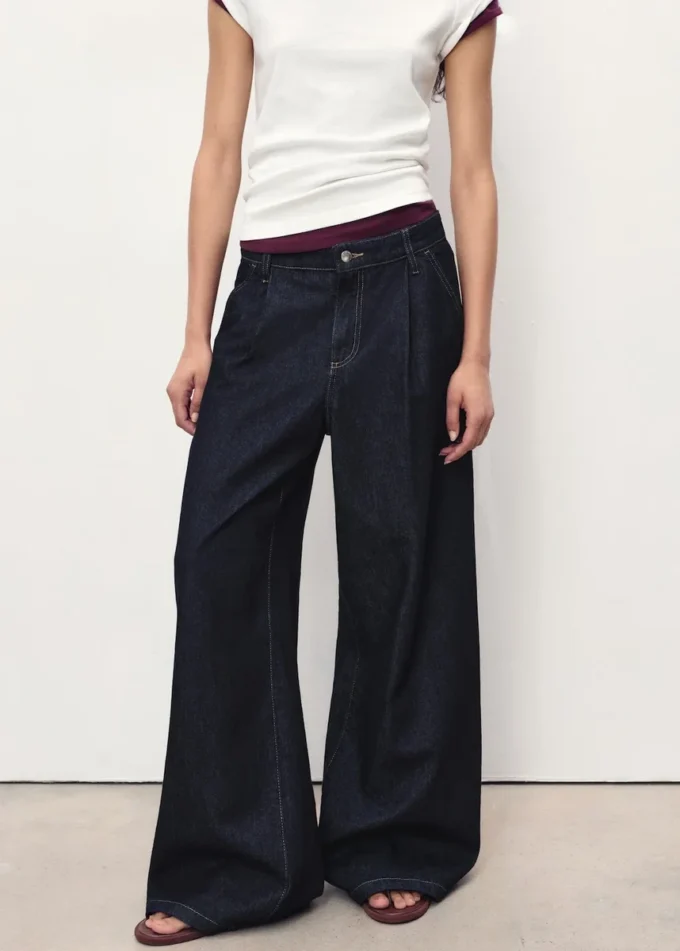 Weite Jeans mit Falten Weite Jeans mit Falten