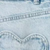 Weite Jeans mit herzförmigen Taschen Weite Jeans mit herzförmigen Taschen