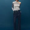 Weite Jeans mit Kristallen