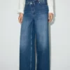 Weite Jeans mit mittlerer Leibhöhe und überkreuztem Bund Weite Jeans mit mittlerer Leibhöhe und überkreuztem Bund