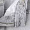 Weite Jeans mit Strasssteinen Weite Jeans mit Strasssteinen