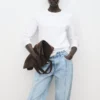 Weite Jeans mit umgeschlagenem Saum Weite Jeans mit umgeschlagenem Saum